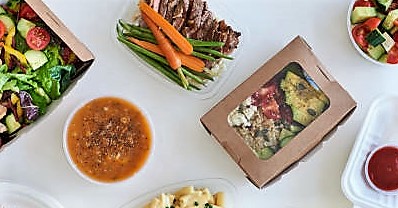 Different options variety assortment of takeout food gourmet takeaways